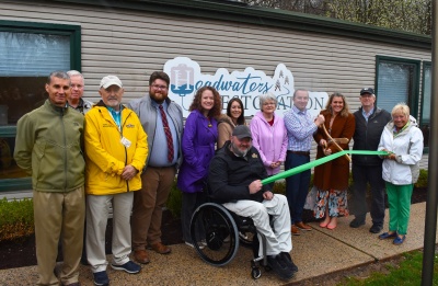 Ribbon Cutting at Headwaters Restoration Therapy; Photo (l-r): Fred Gregg, Terry Helbig, Jay Moyer, Connor Norman, Kendall Ludwig, Commissioner Ryan Savage, Emily Tobin, Kim Durst, Taylor Crabtree, Jessica Meyers, Andrew Fike, and Patty Manown Mash