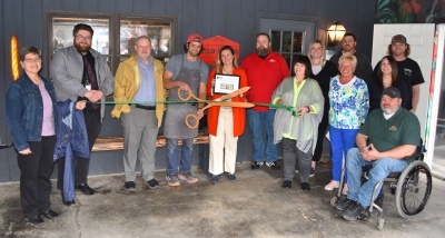 Ribbon Cutting at Wild Ember Bread: photo of owners, Omar Qazi and Janine Alsalam, along with various members of the Garrett County business community